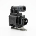 Ignition coil for Chevrolet engine showing high-performance auto spare part in clean condition
