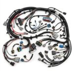 Wiring harness for automotive vehicles showing organized electrical cables and connectors